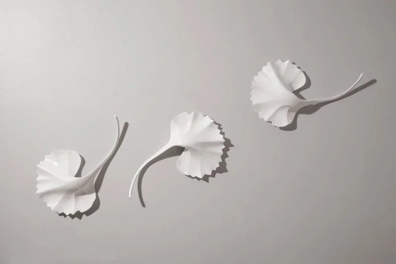 Falling petals installation on white